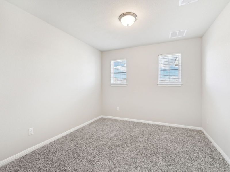 Spacious, unfurnished interior of a new home in Big Sky Ranch - Reserve Collection, Dripping Springs (Image 14).