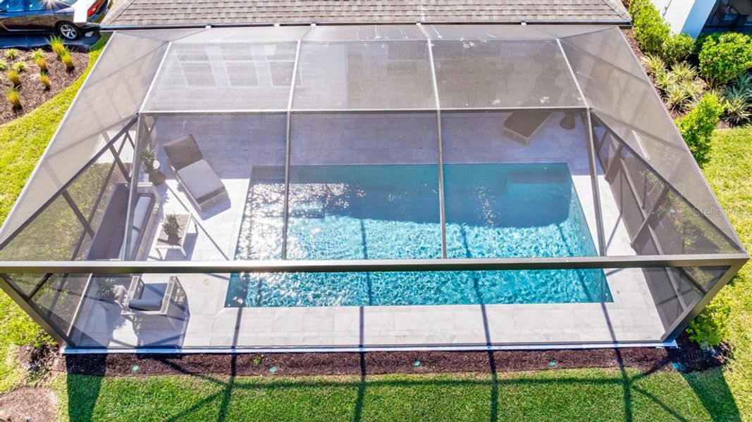 Exterior details and patio area of a home in Palms at Coasterra, Palmetto (Image 2).