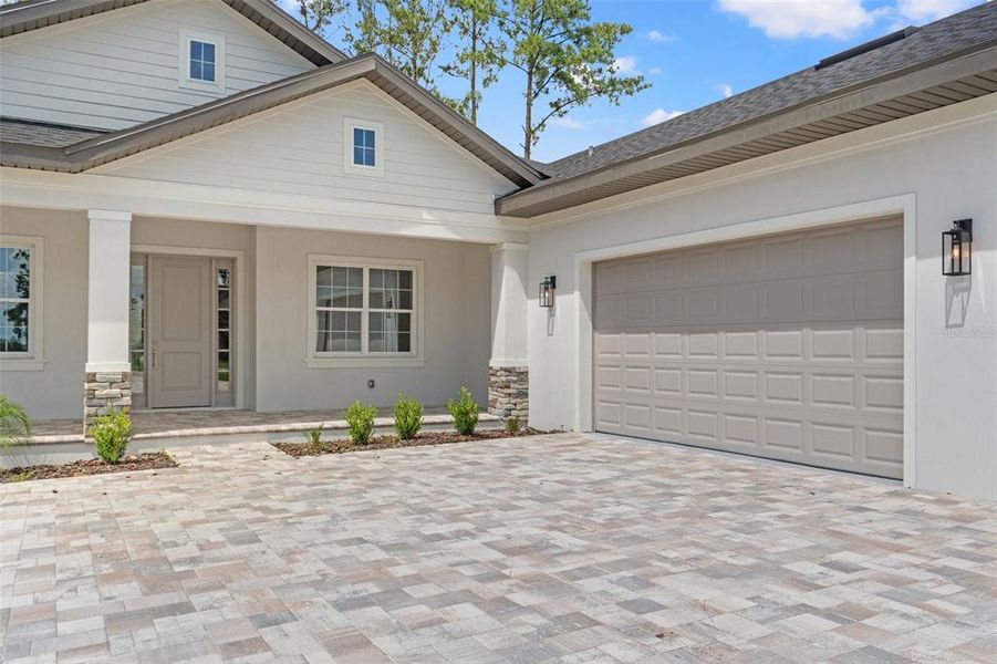 Front exterior of a new home in Southern Hills Plantation, Brooksville, FL, highlighting curb appeal (Image 21).