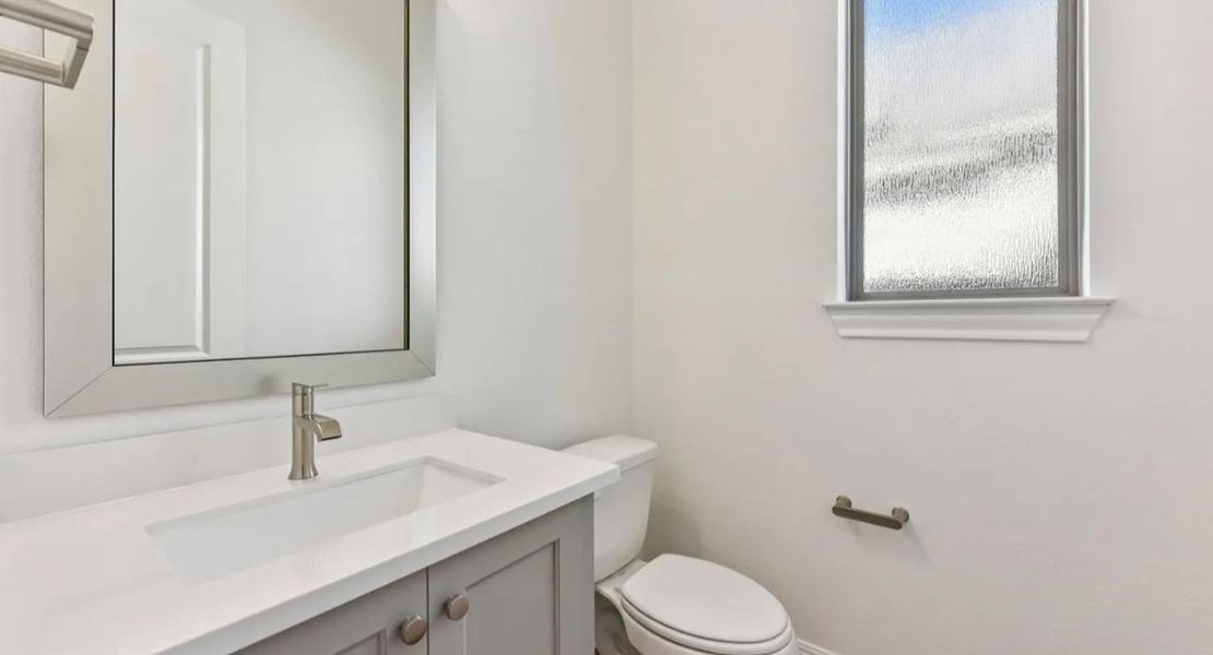 Furnished interior view inside a new home in 6 Creeks, Kyle (Image 8).