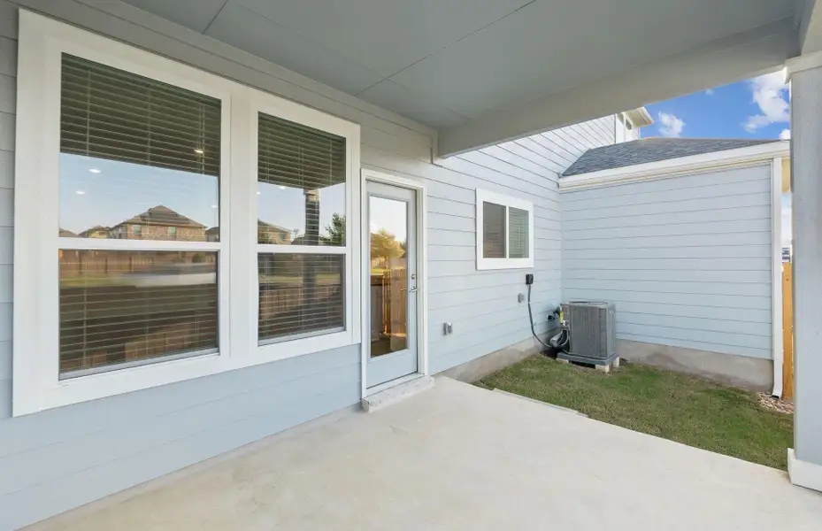 Exterior details and patio area of a home in Northpoint at Old Settlers, Round Rock (Image 3). Exterior details and patio area of a home in Northpoint at Old Settlers, Round Rock (Image 3).
