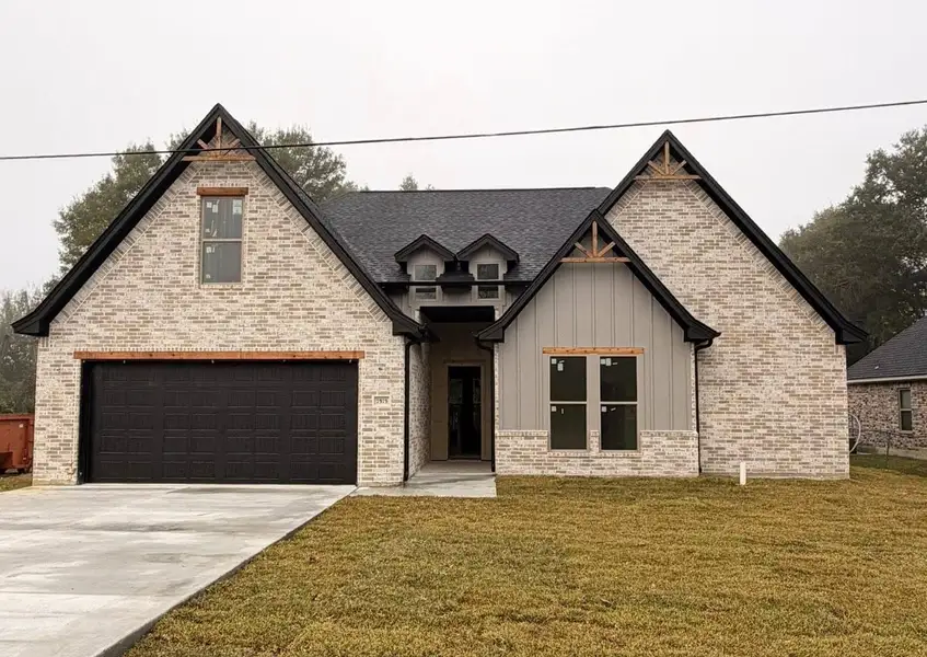 Front exterior of a new home in , Beaumont, TX, highlighting curb appeal (Image 4).