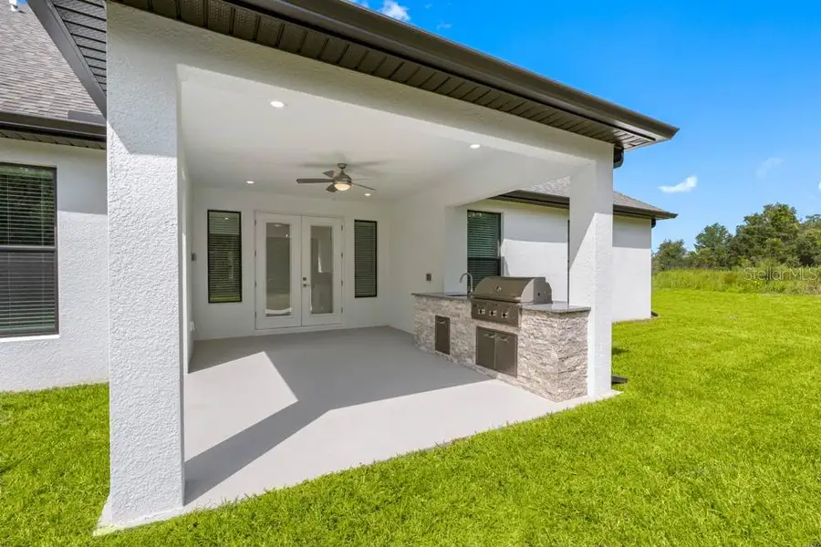 Exterior details and patio area of a home in , Hudson (Image 3). Exterior details and patio area of a home in , Hudson (Image 3).