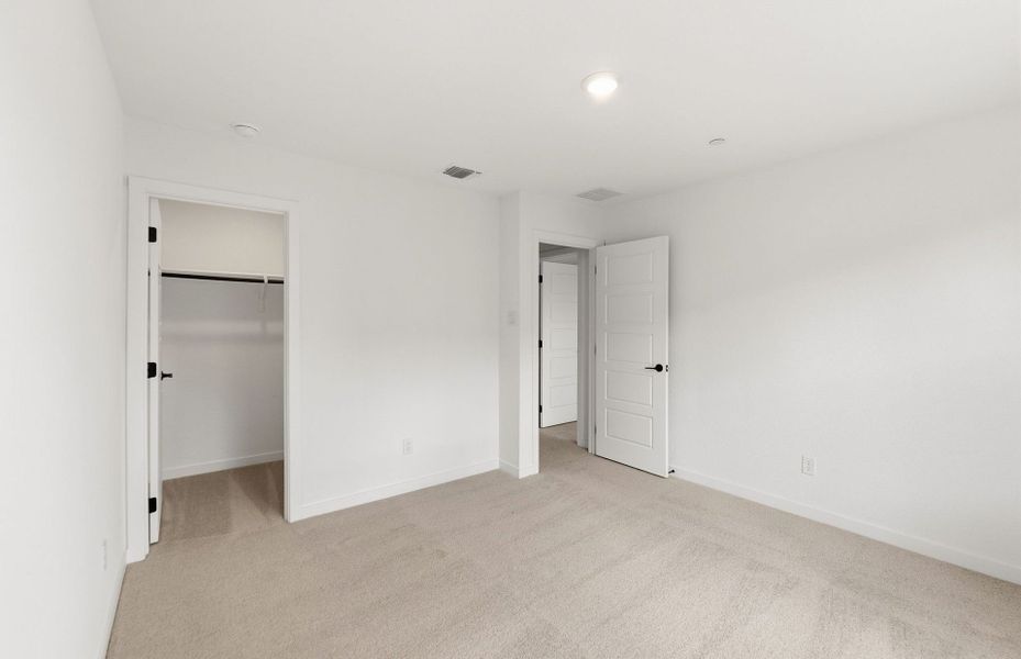 Spacious, unfurnished interior of a new home in Monarch on Main, Round Rock (Image 12).