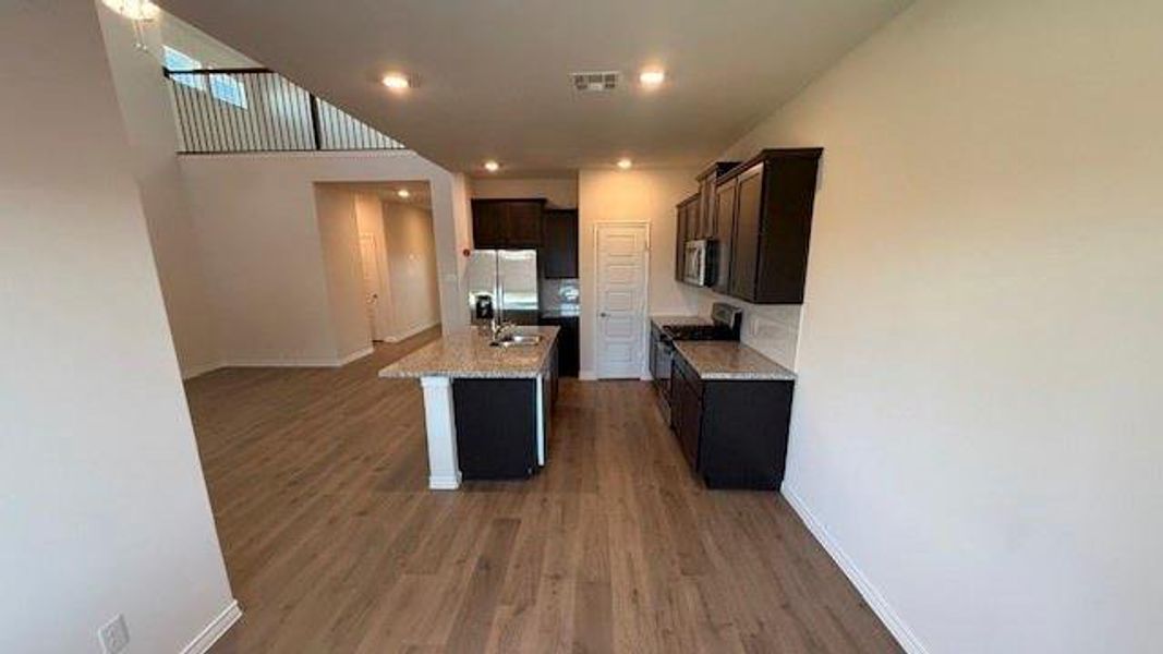 Furnished interior view inside a new home in Fireside by the Lake, Garland (Image 6).