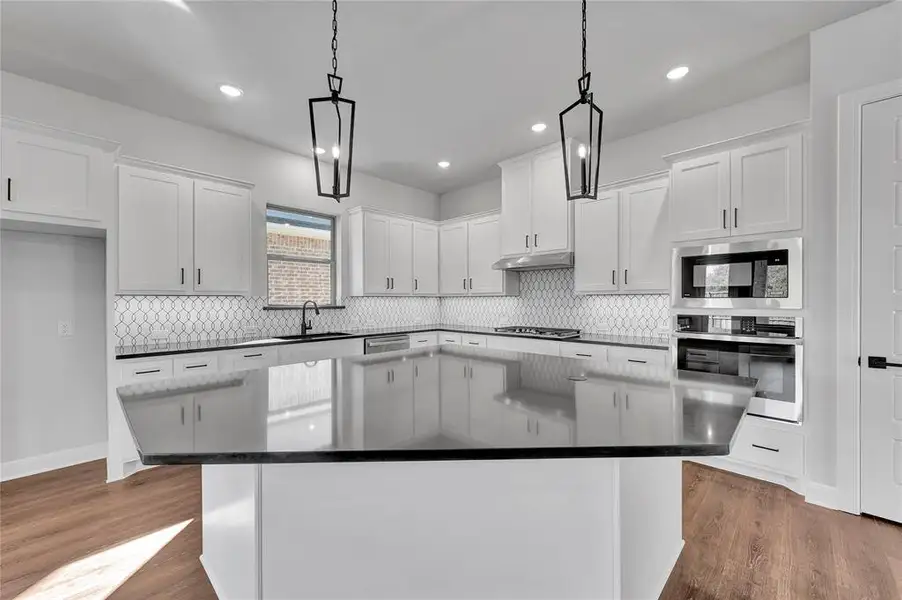 Furnished interior view inside a new home in South Pointe  Cottage Series, Mansfield (Image 9).