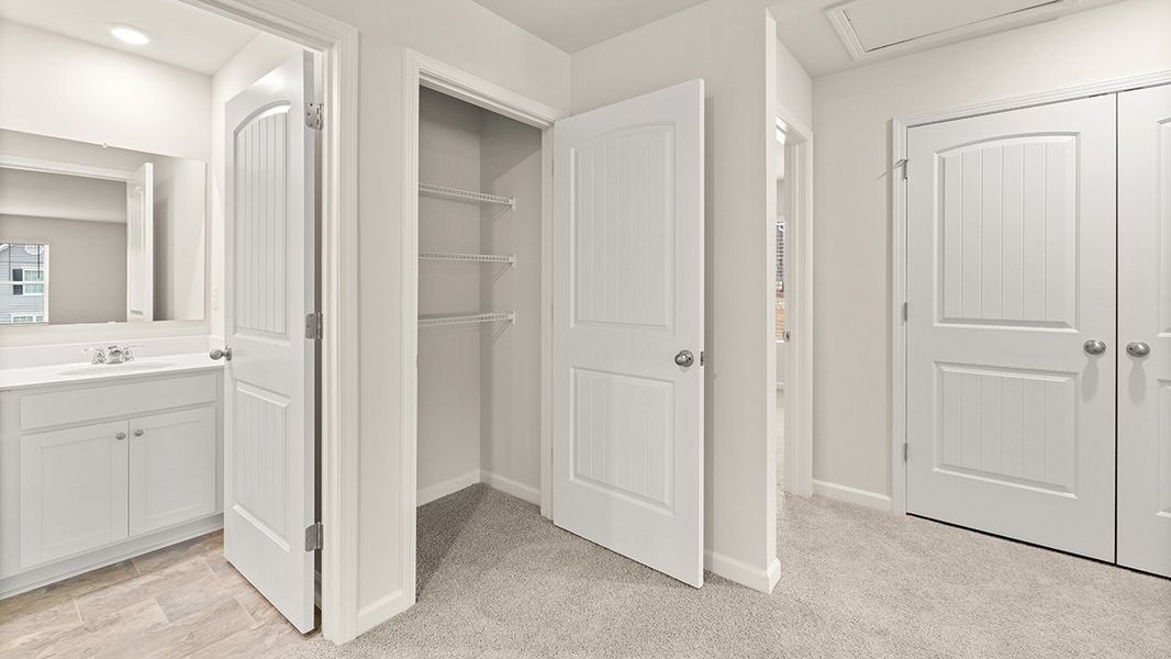 Representative furnished interior of a home built from the Mansfield by D.R. Horton in Northwoods at Mirror Lake, Villa Rica (Image 15).
