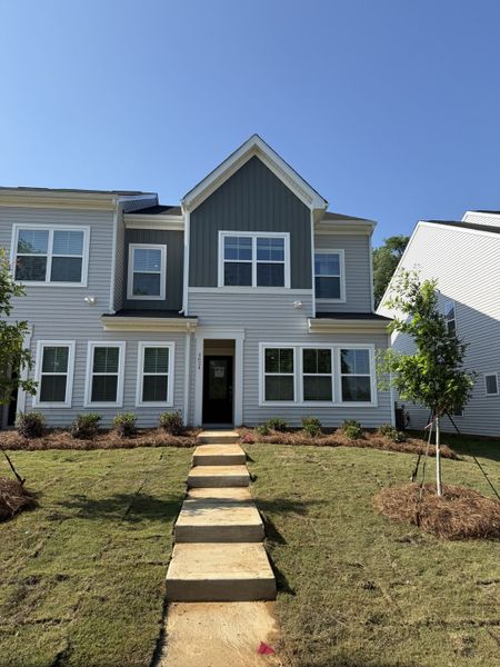 Front exterior of a new home in Lakeview Village, Charlotte, NC, highlighting curb appeal (Image 1). Front exterior of a new home in Lakeview Village, Charlotte, NC, highlighting curb appeal (Image 1).