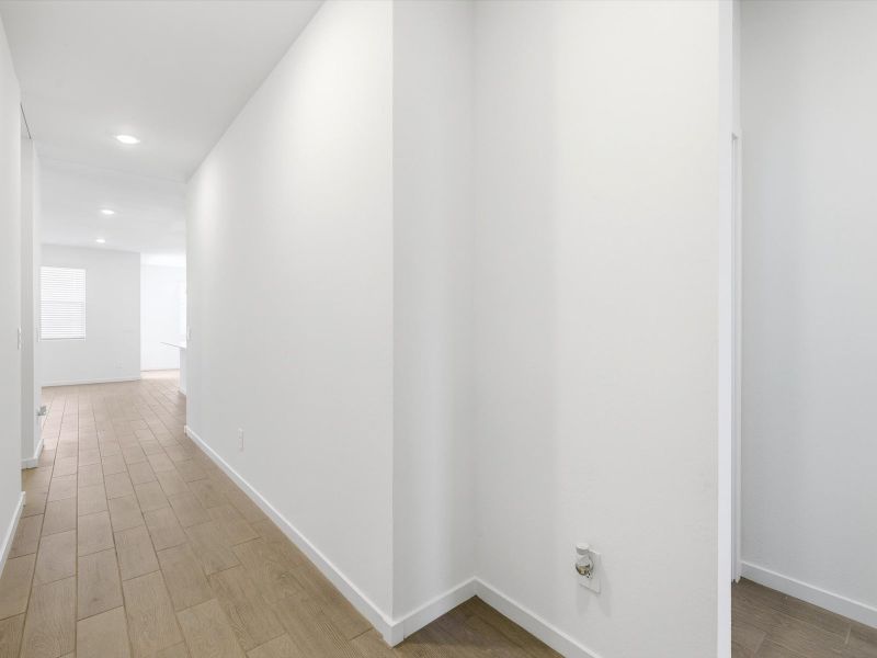 Spacious, unfurnished interior of a new home in Entrada Estate Series, Tolleson (Image 14).