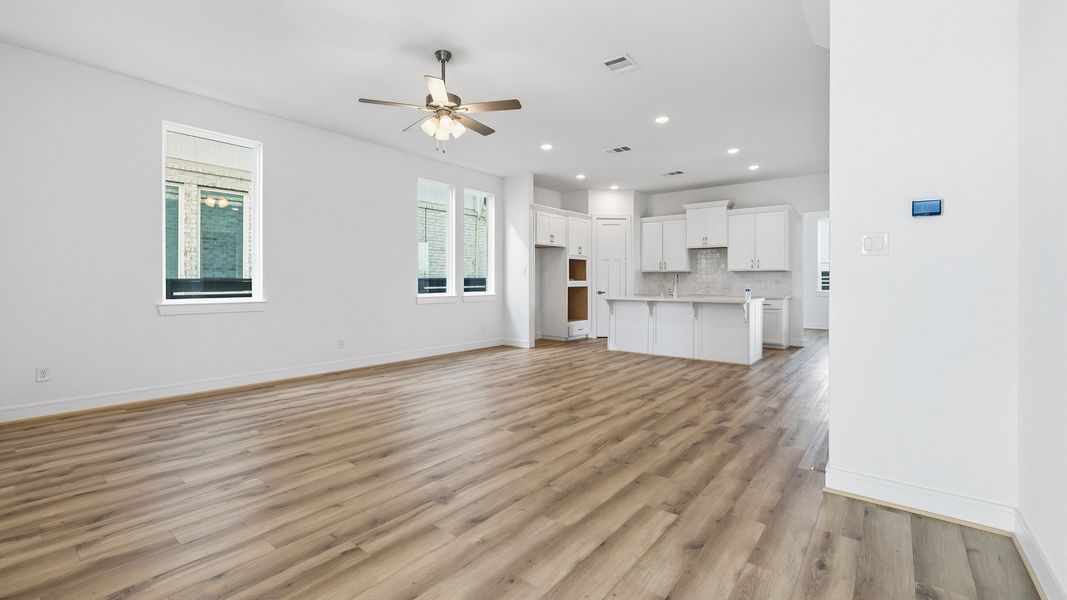 Representative furnished interior of a home built from the Paloma by Brightland Homes in Bridgeland Central, Cypress (Image 5).