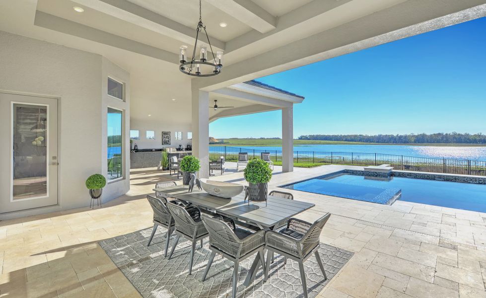 Exterior details and patio area of a home in West Hill Estates, Dade City (Image 25).