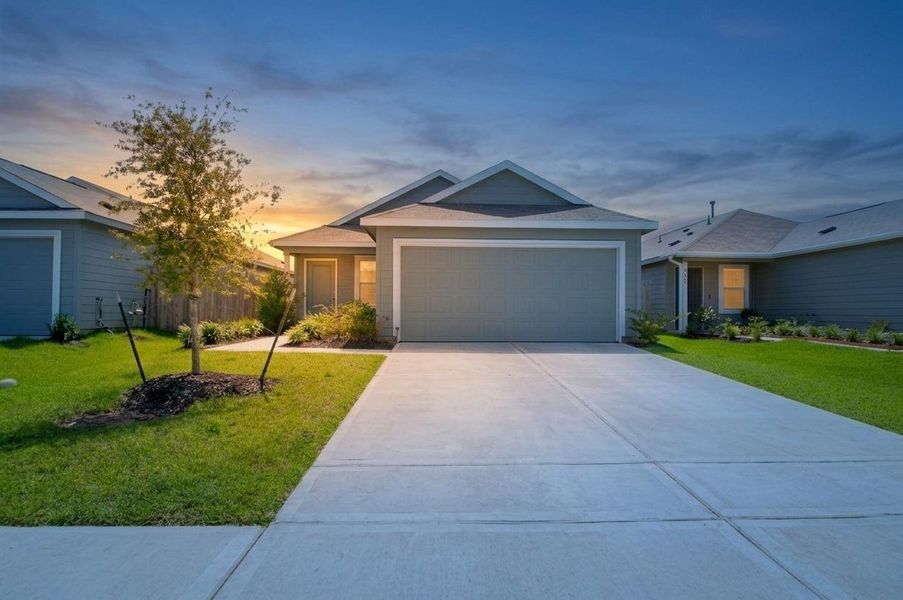 Front exterior of a new home in Wharton Lakes, Wharton, TX, highlighting curb appeal (Image 27).