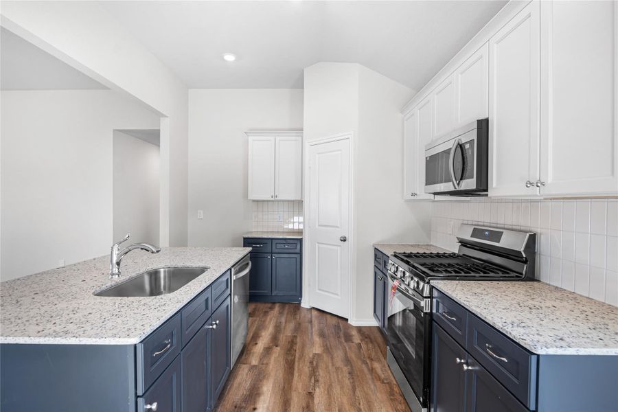 Furnished interior view inside a new home in Hill & Dale Ranch, Splendora (Image 11).