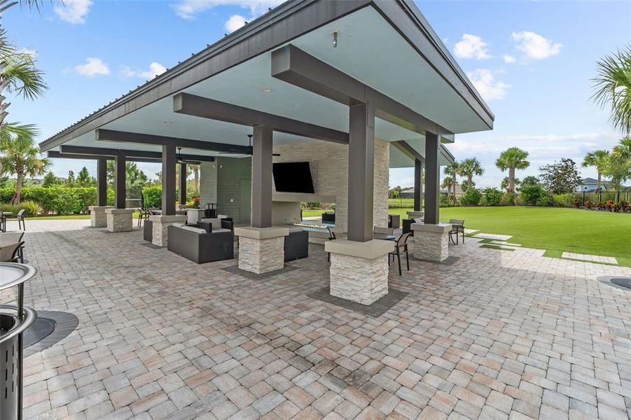 Exterior details and patio area of a home in River Landing, Wesley Chapel (Image 28).