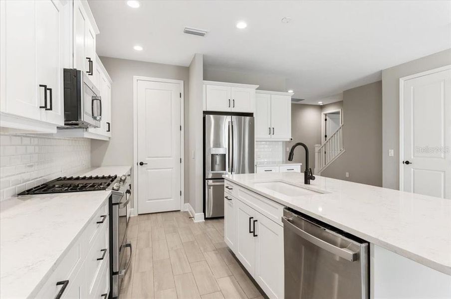 Furnished interior view inside a new home in , Sarasota (Image 7).