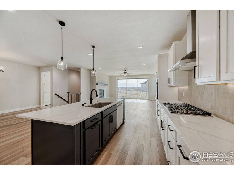 Furnished interior view inside a new home in Barefoot Lakes, Firestone (Image 7).