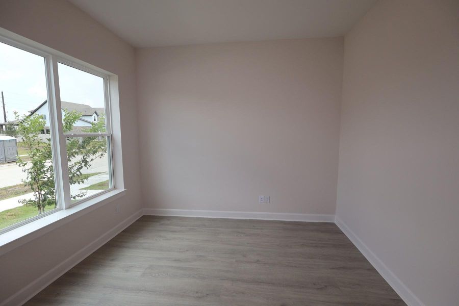 Spacious, unfurnished interior of a new home in Pomona - Grove Row Collection, Manvel (Image 5).