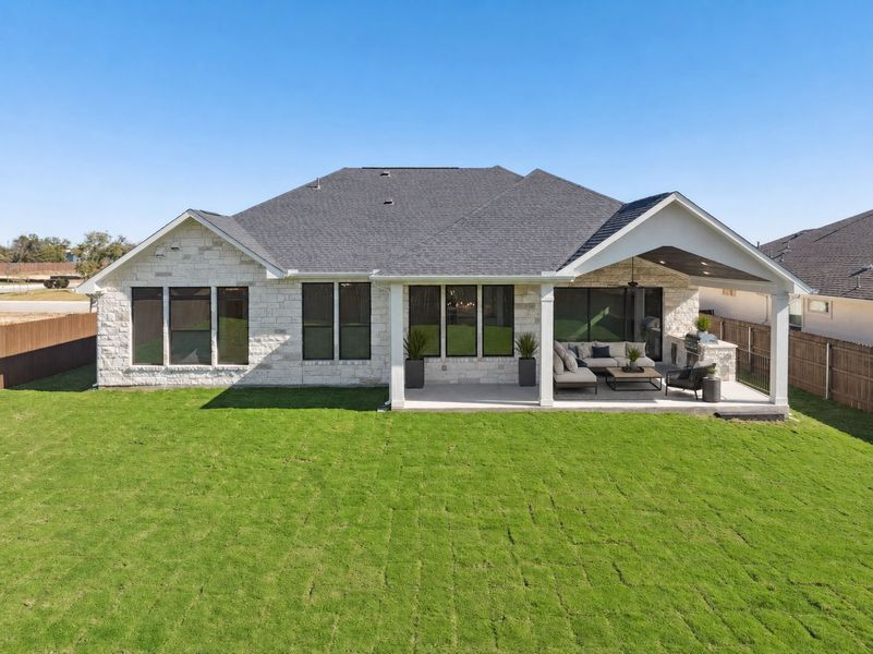 Exterior details and patio area of a home in Riverstone, Georgetown (Image 4).