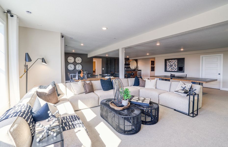 Furnished interior view inside a new home in Hilltop at Inspiration, Aurora (Image 25).