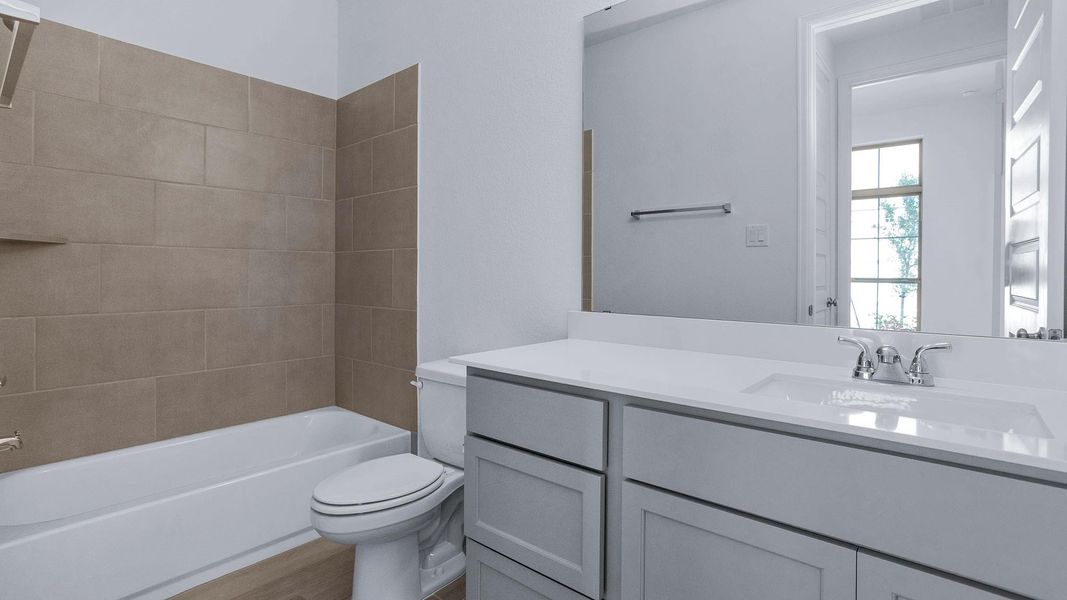 Furnished interior view inside a new home in The Groves 45', Humble (Image 3).