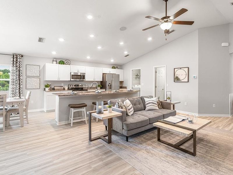 Enjoy a sunny, open living area with LVP flooring. Enjoy a sunny, open living area with LVP flooring.