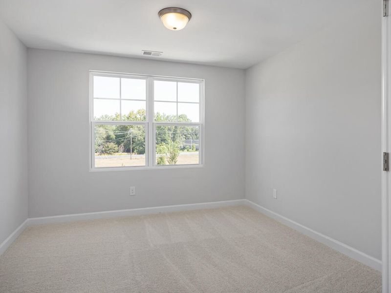 Spacious, unfurnished interior of a new home in Springvale, Fuquay Varina (Image 32).