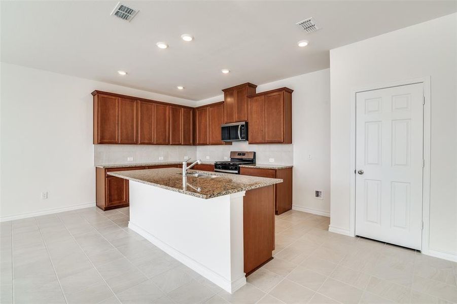Furnished interior view inside a new home in Heartland Signature, Crandall (Image 8).