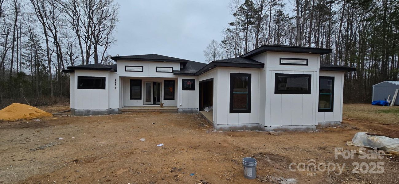 Front exterior of a new home in , Gastonia, NC, highlighting curb appeal (Image 1).