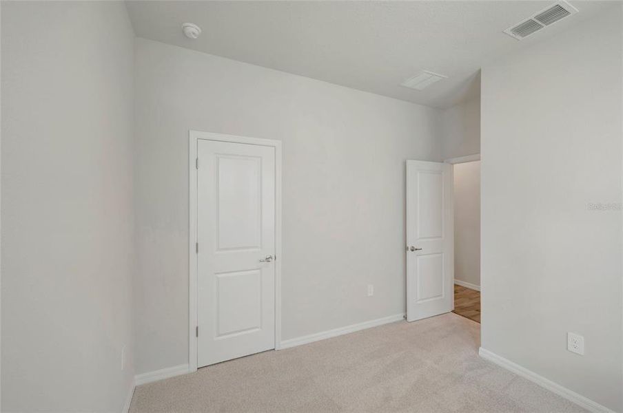 Spacious, unfurnished interior of a new home in Gracewater at Sarasota, Sarasota (Image 18).