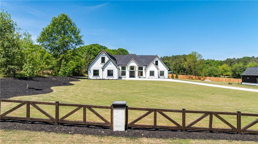 Front exterior of a new home in , Monroe, GA, highlighting curb appeal (Image 36).
