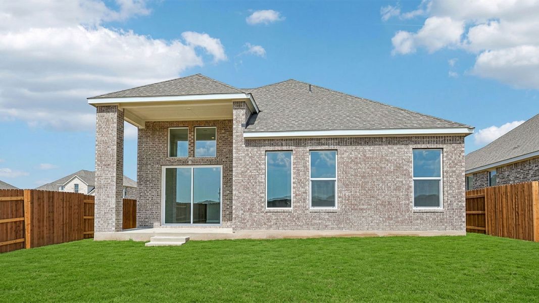Exterior details and patio area of a home in The Enclave at Bar W Ranch, Leander (Image 4).