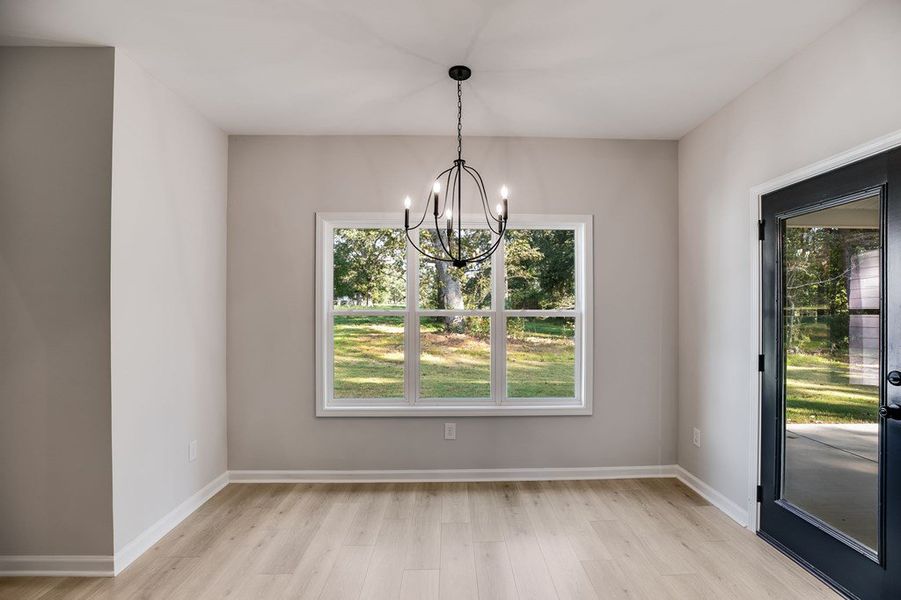 Furnished interior view inside a new home in LOVVORN ESTATES, Carrollton (Image 12).