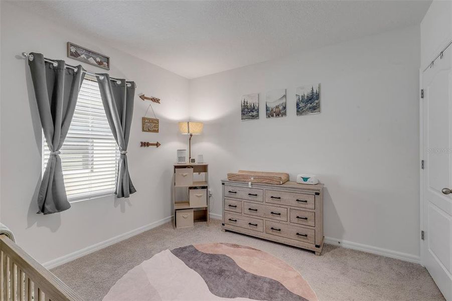 Furnished interior view inside a new home in Groveside at Ormond Station, Ormond Beach (Image 33).