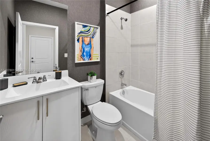 Furnished interior view inside a new home in Acacia Groves, Miami (Image 16). Furnished interior view inside a new home in Acacia Groves, Miami (Image 16).