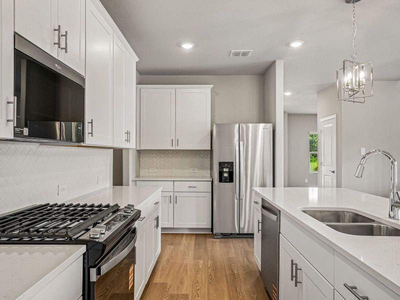 Furnished interior view inside a new home in Eastridge - Signature Series, Princeton (Image 7).