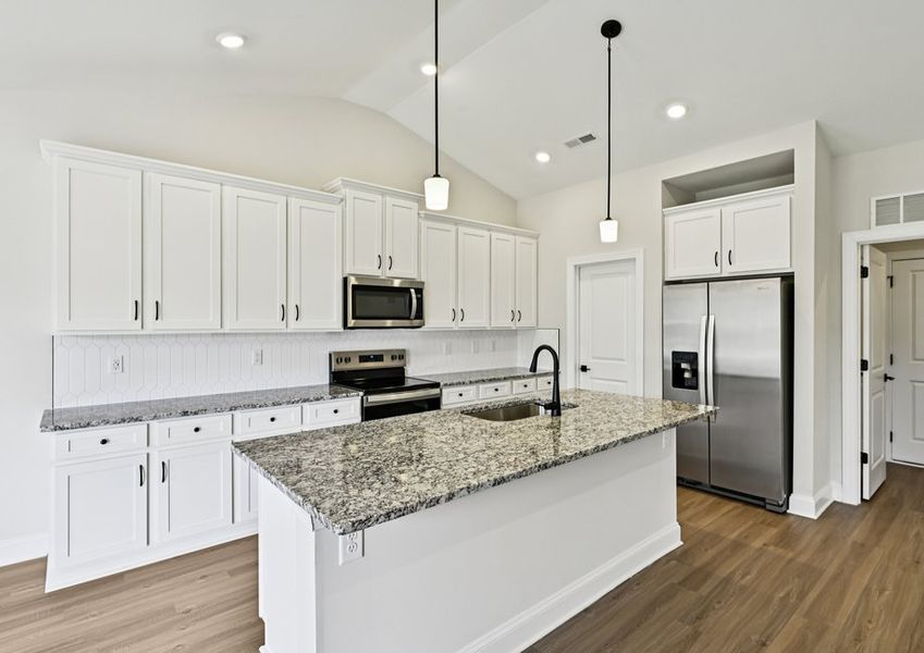 The garage flows seamlessly to the kitchen