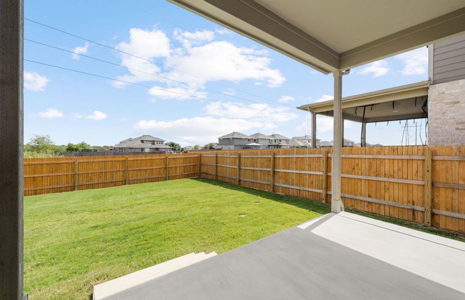 Exterior details and patio area of a home in Crosswinds, Kyle (Image 17).