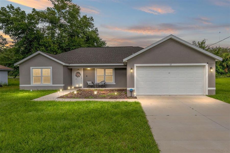 Front exterior of a new home in , Ocala, FL, highlighting curb appeal (Image 24). Front exterior of a new home in , Ocala, FL, highlighting curb appeal (Image 24).