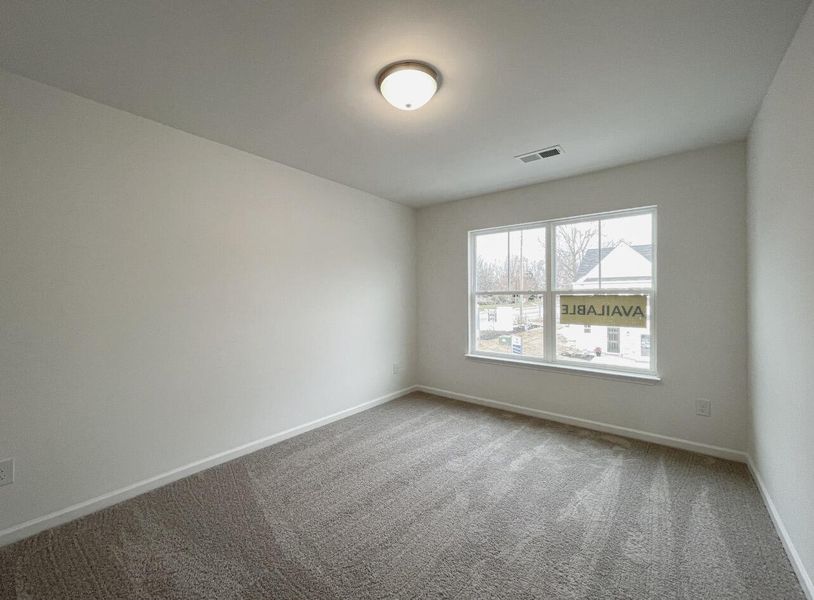 Spacious, unfurnished interior of a new home in East Main Townes, Spartanburg (Image 22).