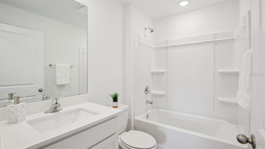 Furnished interior view inside a new home in , Dade City (Image 29).