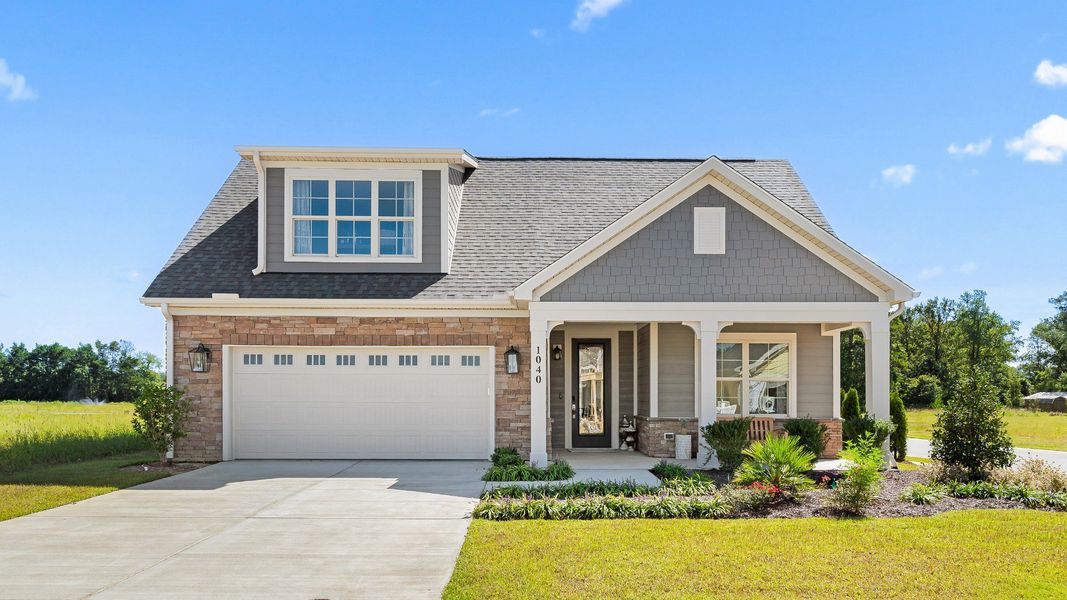 Representative exterior photo of a completed home built from the Promenade III by Epcon Communities in Courtyards by Carrell, Ocean Isle Beach, NC (Image 31). Representative exterior photo of a completed home built from the Promenade III by Epcon Communities in Courtyards by Carrell, Ocean Isle Beach, NC (Image 31).