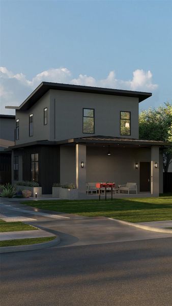 View of front of home featuring a front lawn and stucco siding