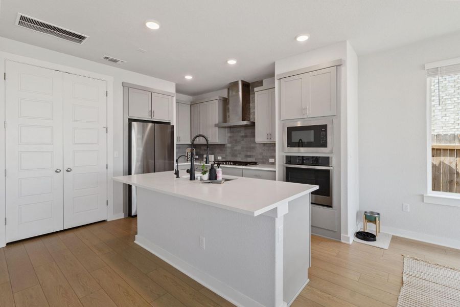 Kitchen with stainless steel appliances