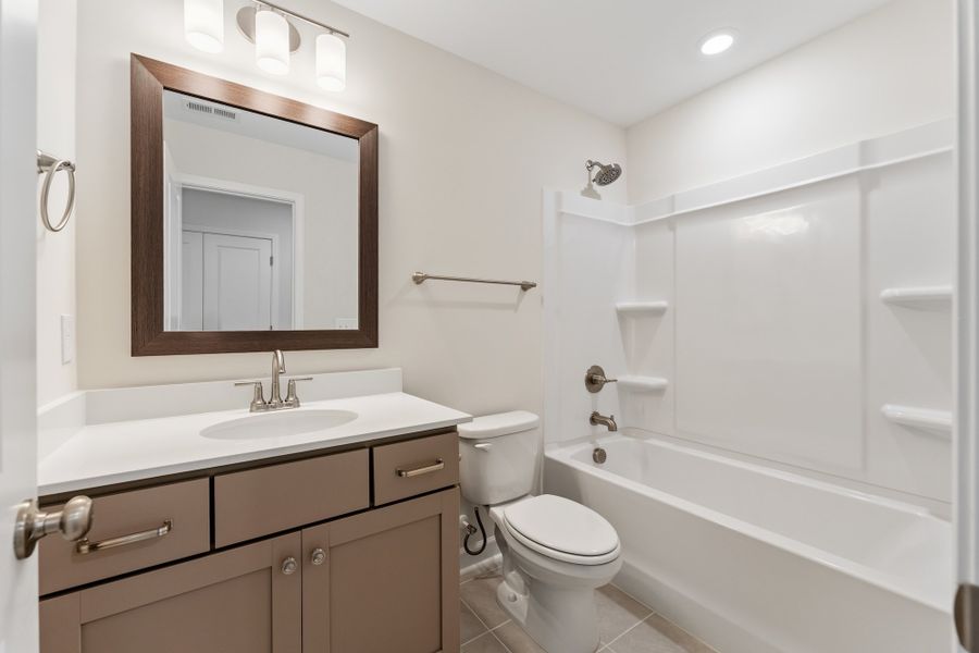 Furnished interior view inside a new home in Landing at Pine Lake, Anderson (Image 16).