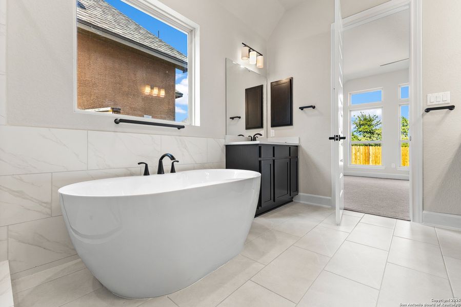 Furnished interior view inside a new home in The Enclave at Potranco Oaks, Castroville (Image 15).
