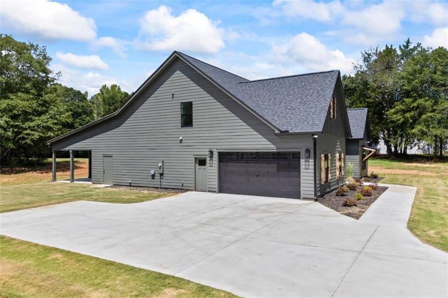 Front exterior of a new home in , Monroe, GA, highlighting curb appeal (Image 33).