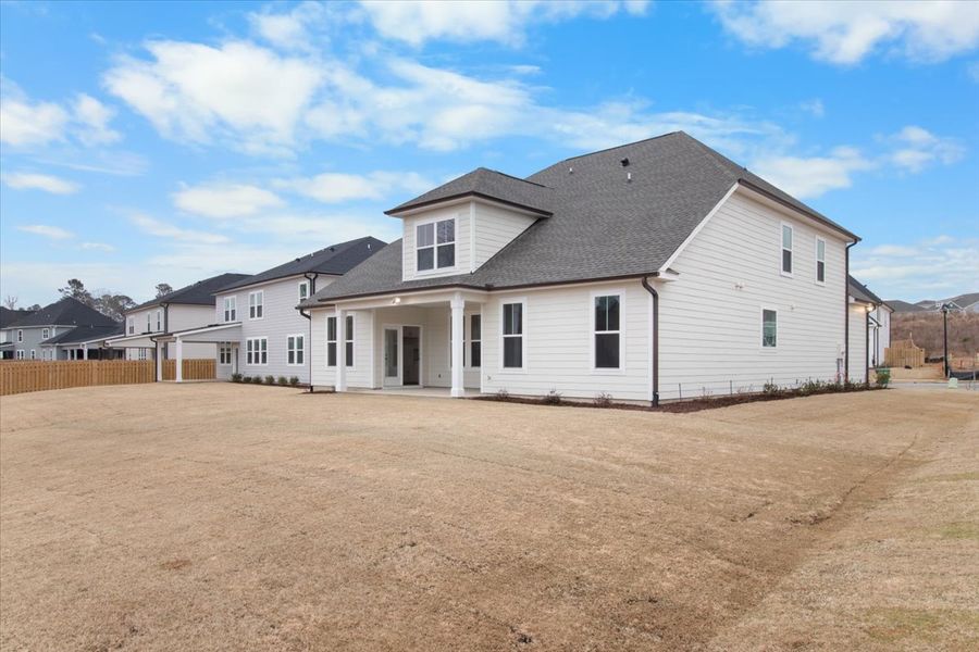 Backyard & Covered Patio | 915 Lillian Park Drive, The Nottaway Plan by Ivey Homes