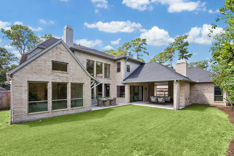 Exterior details and patio area of a home in , Houston (Image 3).