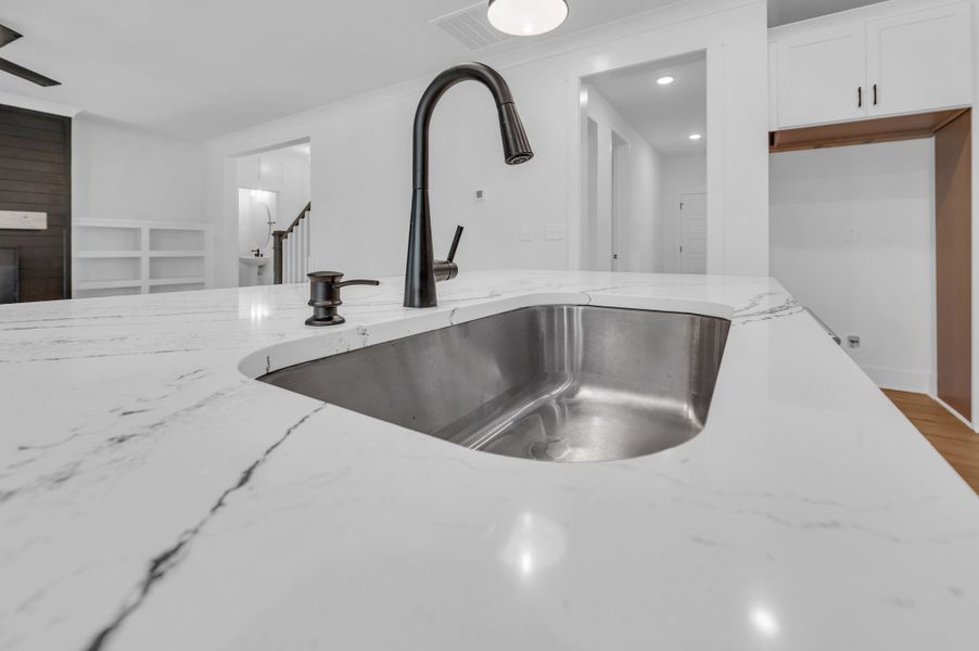Representative furnished interior of a home built from the The Bradley by RobuckHomes in Windwater, Hampstead (Image 14).