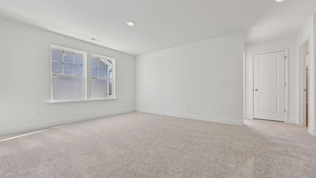 Furnished interior view inside a new home in Sidney Creek Single Family, Zebulon (Image 35).